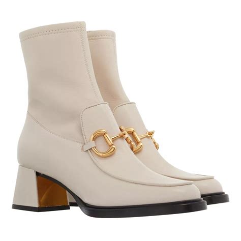 all white gucci boots|Gucci boots white laces.